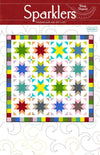 Image of the Sparklers quilt pattern by Wendy Sheppard for Riley Blake Designs. Features stars on a white background. 
Cute Little Fabric Shop