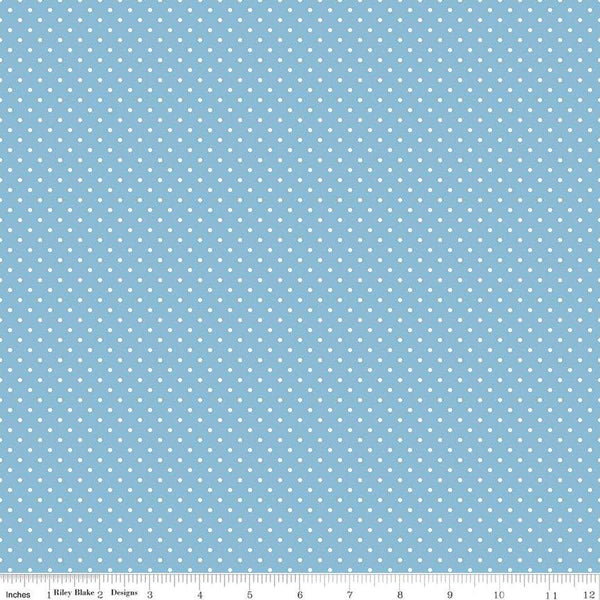 Image of the Swiss Dot Sweet Celestial quilting cotton fabric by The RBD Designers for Riley Blake Designs. Features white dots on light blue swiss dots. 
Cute Little Fabric Shop