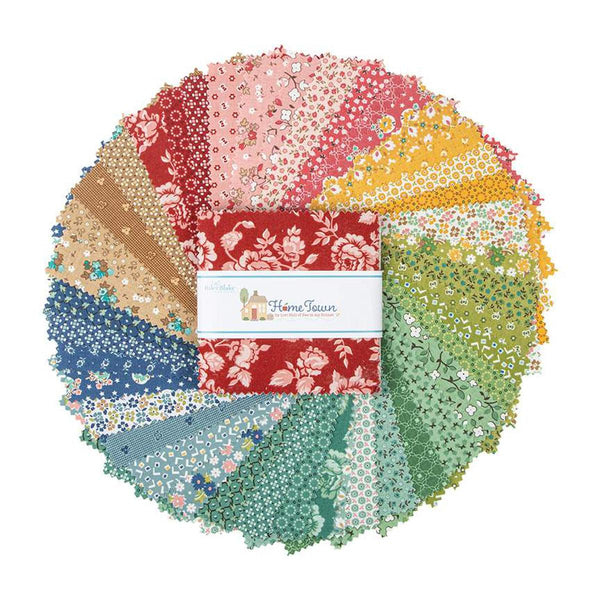 Image of the Home Town quilting cotton 5 inch stacker by Lori Holt for Riley Blake Designs. Features floral patterns on various backgrounds. 
Cute Little Fabric Shop