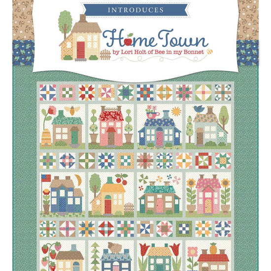 Image of the Home Town storyboard by Lori Holt for Riley Blake Designs. Features houses on a quilt with a teal border. 
Cute Little Fabric Shop