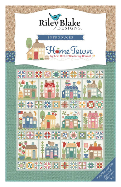 Image of the Home Town storyboard by Lori Holt for Riley Blake Designs. Features houses on a quilt with a teal border. 
Cute Little Fabric Shop