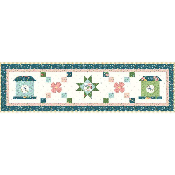 Image of the Melody Lane Quilt and Runner quilt pattern by Beverly McCullough for Riley Blake Designs. Features birdhouses, flowers, and rows of squares on white. 
Cute Little Fabric Shop