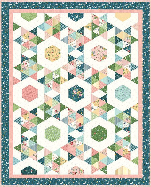 Image of the Starlight quilt pattern by Beverly McCullough for Riley Blake Designs. Features a geometric pattern with a teal bordered quilt. 
Cute Little Fabric Shop