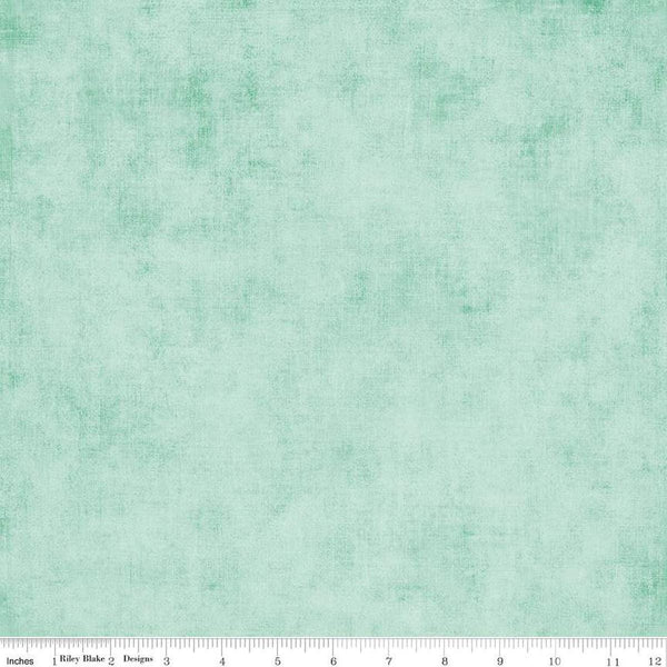 Image of the Shades Hint of Mint quilting cotton by Riley Blake Designs. Features a textured pattern on light mint. 
Cute Little Fabric Shop