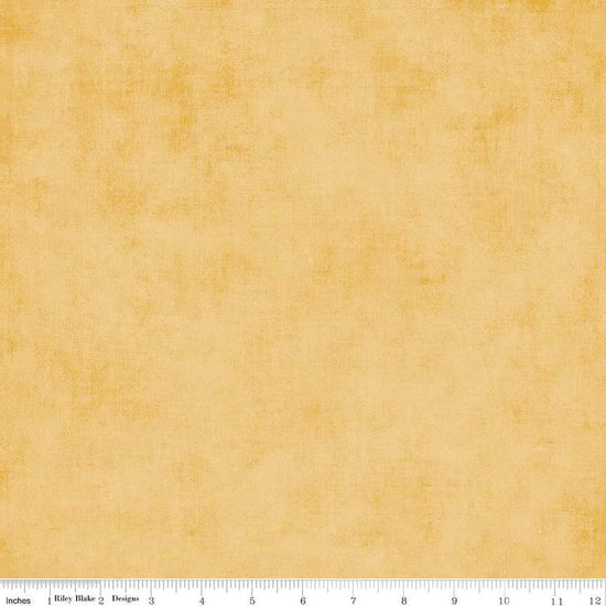 Image of the Shades Honey quilting cotton by Riley Blake Designs. Features a textured pattern on light orange gold. 
Cute Little Fabric Shop