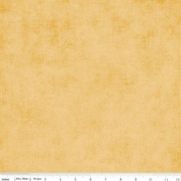 Image of the Shades Honey quilting cotton by Riley Blake Designs. Features a textured pattern on light orange gold. 
Cute Little Fabric Shop