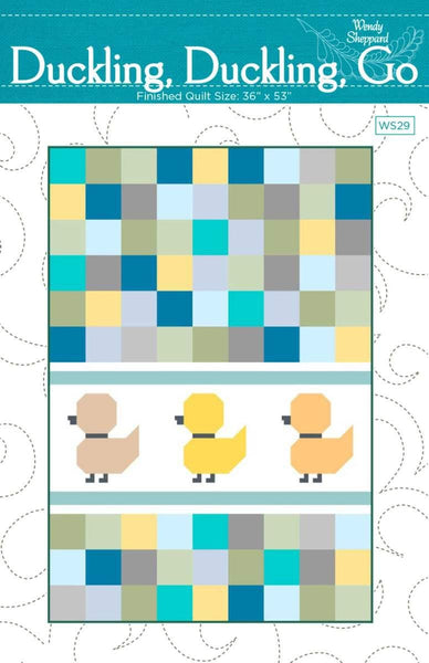 Image of the Duckling, Duckling, Go Quilt pattern by Wendy Sheppard for Riley Blake Designs. Features little ducklings with yellow, blue, and green squares. 
Cute Little Fabric Shop