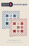 Image of the Nantucket quilt pattern by Minick & Simpson for Moda Fabrics. Features stars on a quilt. 
Cute Little Fabric Shop