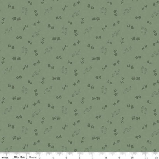 Image of the Lets Get Lost in the Woods Tracks Sage quilting cotton fabric by Tara Reed for Riley Blake Designs. Features tone on tone animal tracks on a light green background. 
Cute Little Fabric Shop
