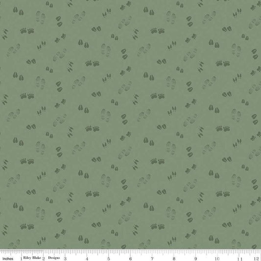Image of the Lets Get Lost in the Woods Tracks Sage quilting cotton fabric by Tara Reed for Riley Blake Designs. Features tone on tone animal tracks on a light green background. 
Cute Little Fabric Shop