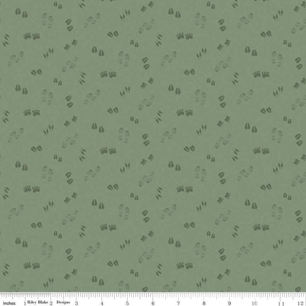 Image of the Lets Get Lost in the Woods Tracks Sage quilting cotton fabric by Tara Reed for Riley Blake Designs. Features tone on tone animal tracks on a light green background. 
Cute Little Fabric Shop