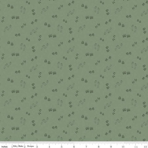 Image of the Lets Get Lost in the Woods Tracks Sage quilting cotton fabric by Tara Reed for Riley Blake Designs. Features tone on tone animal tracks on a light green background. 
Cute Little Fabric Shop