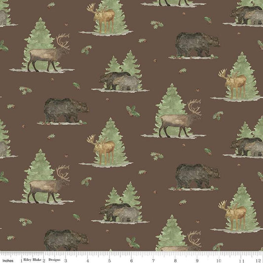 Image of the Lets Get Lost in the Woods Main Brown quilting cotton fabric by Tara Reed for Riley Blake Designs. Features  big game animals on a background with trees and oak leaves and acorns on a dark brown background. 
Cute Little Fabric Shop
