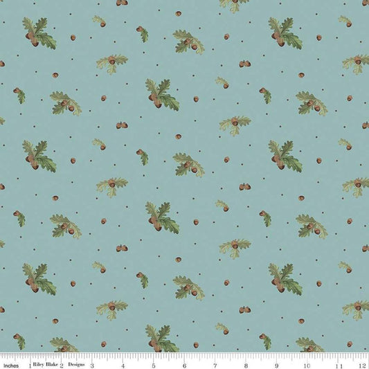 Image of the Lets Get Lost in the Woods Acorns and Leaves Vintage Blue quilting cotton fabric by Tara Reed for Riley Blake Designs. Features oak leaves and acorns on a medium blue background. 
Cute Little Fabric Shop