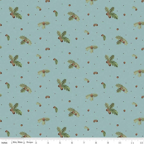 Image of the Lets Get Lost in the Woods Acorns and Leaves Vintage Blue quilting cotton fabric by Tara Reed for Riley Blake Designs. Features oak leaves and acorns on a medium blue background. 
Cute Little Fabric Shop
