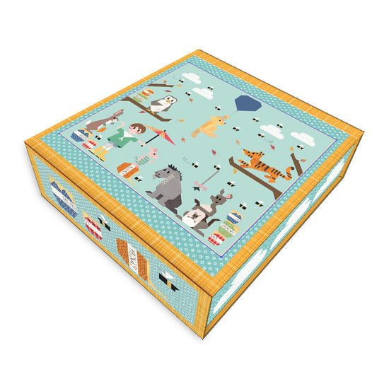 Image of the 100 Acre Wood Quilt Kit by Art East Quilting Co. using Lori Holt fabrics by Riley Blake Designs. Features Winnie-the-Pooh animals on a quilt in a keepsake box with aqua and pink.
Cute Little Fabric Shop