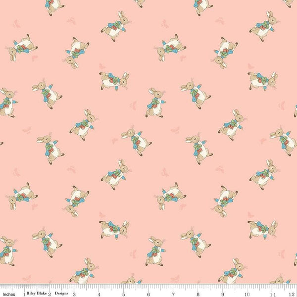 Image of the Flannel The Tale of Peter Rabbit Main Coral flannel cotton fabric by Beatrix Potter for Riley Blake Designs. Features characters on a coral pink background. 
Cute Little Fabric Shop