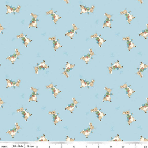 Image of the Flannel The Tale of Peter Rabbit Main Blue flannel cotton fabric by Beatrix Potter for Riley Blake Designs. Features characters on a light blue background. 
Cute Little Fabric Shop