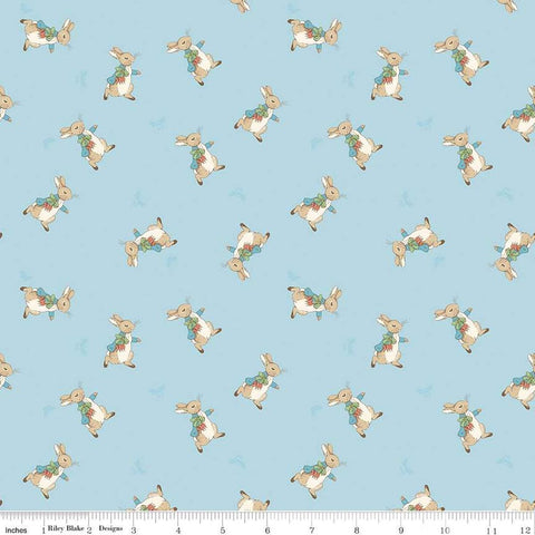 Image of the Flannel The Tale of Peter Rabbit Main Blue flannel cotton fabric by Beatrix Potter for Riley Blake Designs. Features characters on a light blue background. 
Cute Little Fabric Shop