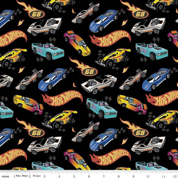 Image of the Hot Wheels Made to Race Car Race Black quilting cotton fabric by Riley Blake Designs. Official licensed product. Territorial sales restrictions may apply. Features logos and cars on a black background.
Cute Little Fabric Shop