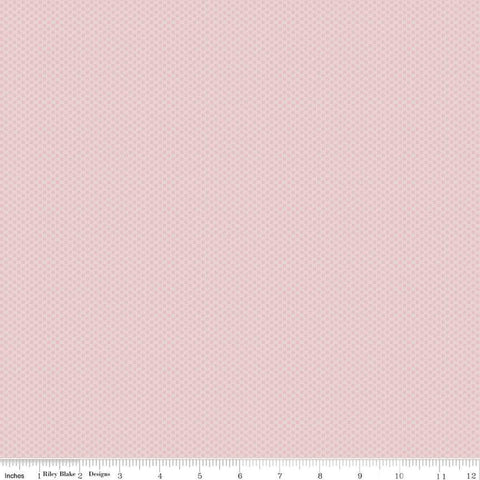 Image of the Flannel POParazzi Pink Dogwood fabric by  The RBD Designers by Riley Blake Designs. Features small tone on tone dots on a light pink background. 
Cute Little Fabric Shop