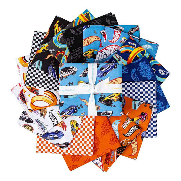 Image of the Hot Wheels Made to Race Fat Quarter Bundle by Riley Blake Designs. Official licensed product. Features cars, icons, and flames on blue, white, and orange backgrounds. 
Cute Little Fabric Shop