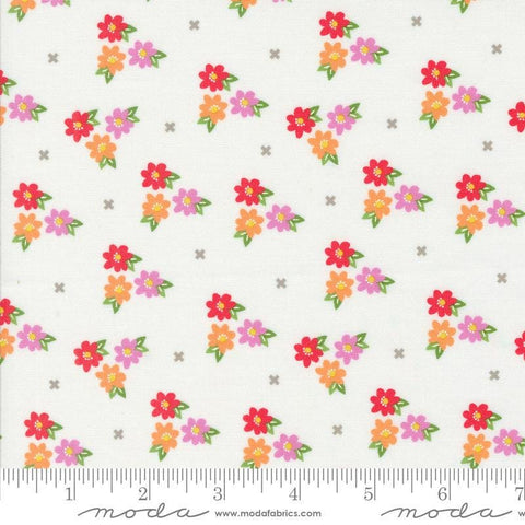 Image of the Laguna Sunrise Blossoms Off White quilting cotton fabric by Sherri & Chelsi for Moda Fabrics. Features small flowers on a white background. 
Cute Little Fabric Shop