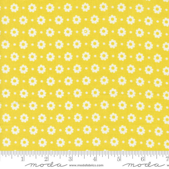 Image of the Laguna Sunrise Floral Dot Citrine quilting cotton fabric by Sherri & Chelsi for Moda Fabrics. Features small flowers on a light yellow background. 
Cute Little Fabric Shop