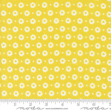 Image of the Laguna Sunrise Floral Dot Citrine quilting cotton fabric by Sherri & Chelsi for Moda Fabrics. Features small flowers on a light yellow background. 
Cute Little Fabric Shop