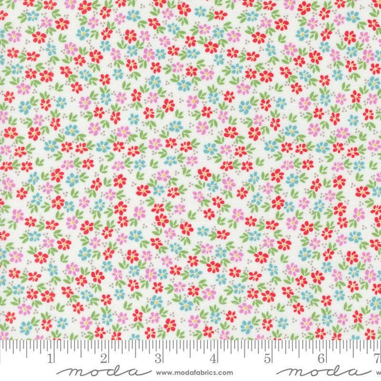 Image of the Laguna Sunrise Small Flowers Off White quilting cotton fabric by Sherri & Chelsi for Moda Fabrics. Features small scattered flowers on a white background. 
Cute Little Fabric Shop