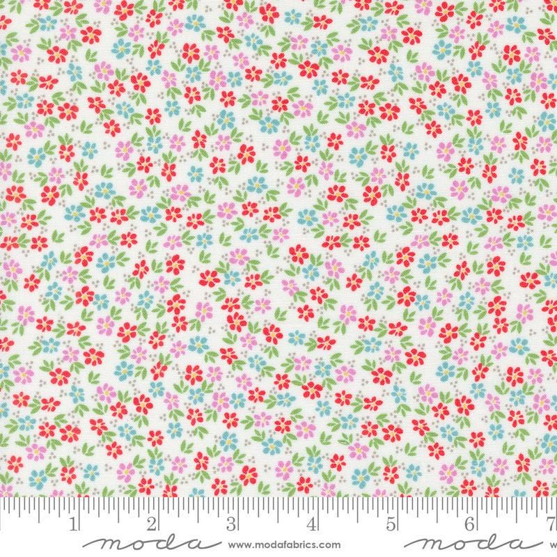Image of the Laguna Sunrise Small Flowers Off White quilting cotton fabric by Sherri & Chelsi for Moda Fabrics. Features small scattered flowers on a white background. 
Cute Little Fabric Shop