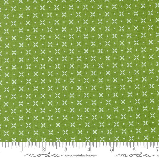 Image of the Laguna Sunrise Orange Peel Fresh Grass quilting cotton fabric by Sherri & Chelsi for Moda Fabrics. Features small geometric orange peels on a grass background. 
Cute Little Fabric Shop