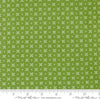 Image of the Laguna Sunrise Orange Peel Fresh Grass quilting cotton fabric by Sherri & Chelsi for Moda Fabrics. Features small geometric orange peels on a grass background. 
Cute Little Fabric Shop