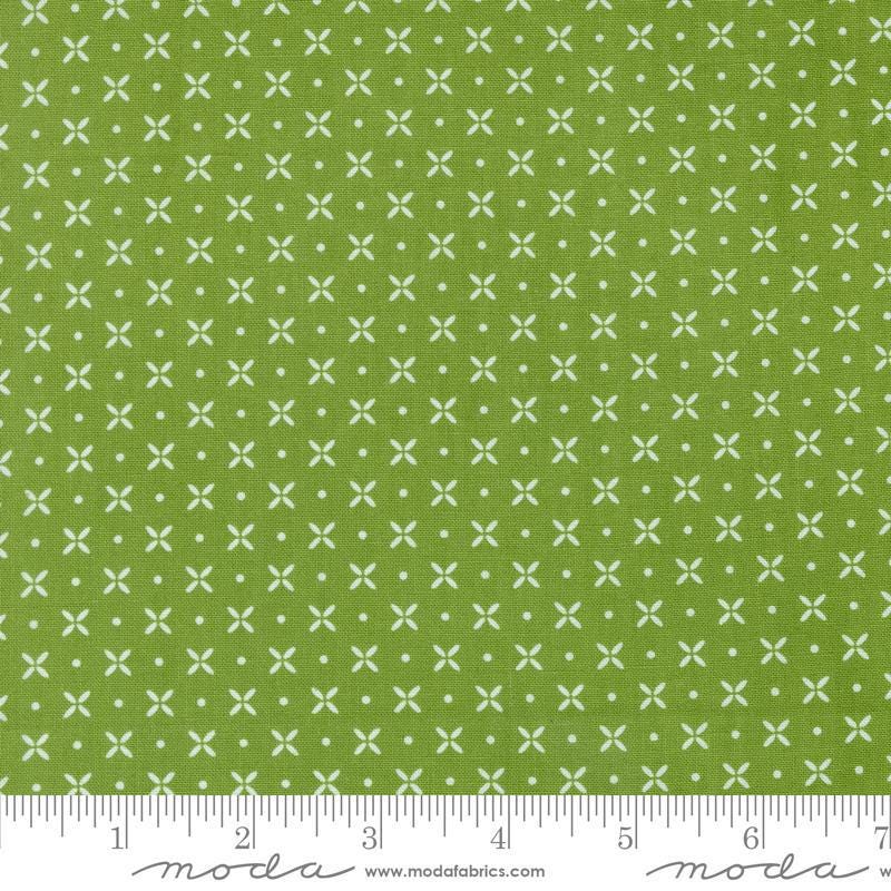 Image of the Laguna Sunrise Orange Peel Fresh Grass quilting cotton fabric by Sherri & Chelsi for Moda Fabrics. Features small geometric orange peels on a grass background. 
Cute Little Fabric Shop