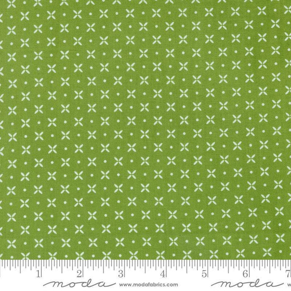 Image of the Laguna Sunrise Orange Peel Fresh Grass quilting cotton fabric by Sherri & Chelsi for Moda Fabrics. Features small geometric orange peels on a grass background. 
Cute Little Fabric Shop