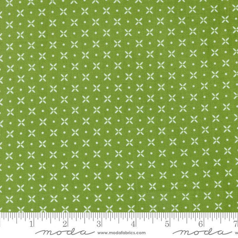 Image of the Laguna Sunrise Orange Peel Fresh Grass quilting cotton fabric by Sherri & Chelsi for Moda Fabrics. Features small geometric orange peels on a grass background. 
Cute Little Fabric Shop
