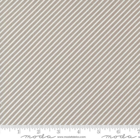Image of the Laguna Sunrise Stripes Stone quilting cotton fabric by Sherri & Chelsi for Moda Fabrics. Features diagonal stripes on a gray background. 
Cute Little Fabric Shop