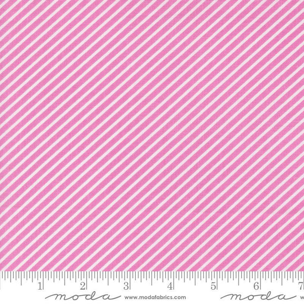 Image of the Laguna Sunrise Stripes Sweet Pea quilting cotton fabric by Sherri & Chelsi for Moda Fabrics. Features diagonal stripes on a pink purple background. 
Cute Little Fabric Shop