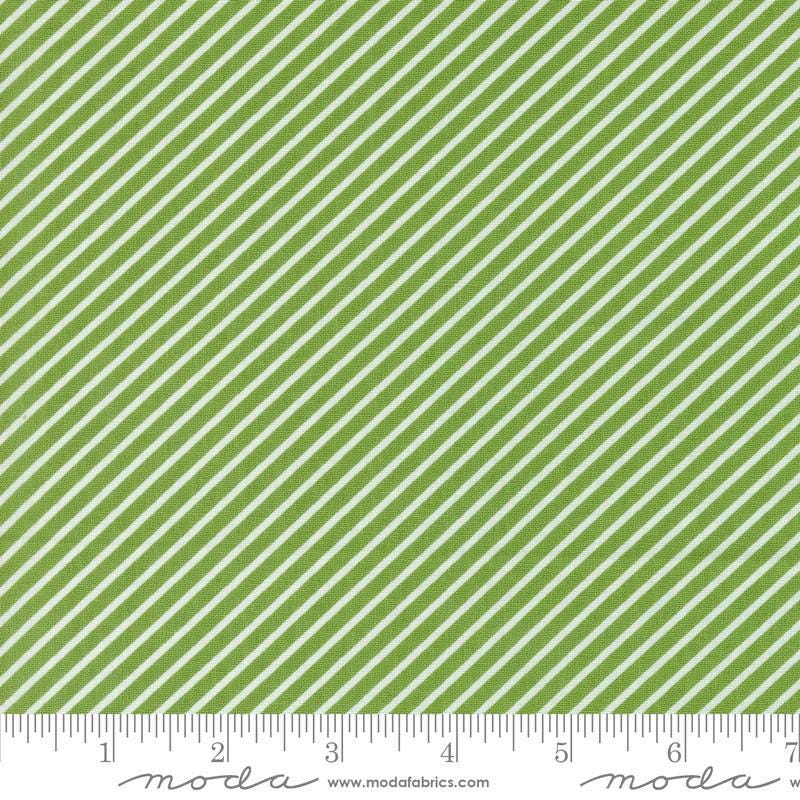 Image of the Laguna Sunrise Stripes Fresh Grass quilting cotton fabric by Sherri & Chelsi for Moda Fabrics. Features diagonal stripes on a green background. 
Cute Little Fabric Shop