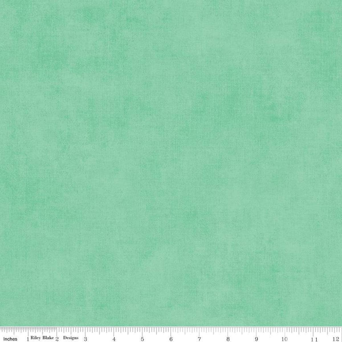 Image of the Shades Sweet Mint quilting cotton fabric by Riley Blake Designs. Features a mint fabric with a mottled semisold background. 
Cute Little Fabric Shop