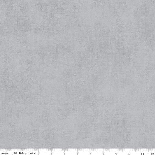 Image of the Shades Silver quilting cotton fabric by Riley Blake Designs. Features a light grey fabric with a mottled semisold background. 
Cute Little Fabric Shop