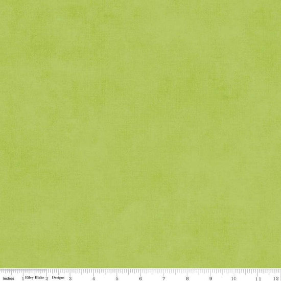 Image of the Shades Lettuce quilting cotton fabric by Riley Blake Designs. Features a light green fabric with a mottled semisold background. 
Cute Little Fabric Shop