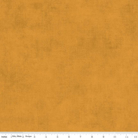 Image of the Shades Butterscotch quilting cotton fabric by Riley Blake Designs. Features a dusty orange yellow fabric with a mottled semisold background. 
Cute Little Fabric Shop