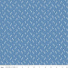 Image of the Wanderlust Jasmine Dusk quilting cotton fabric by Danelys Sidron for Riley Blake Designs. Features an array of flowers on a dusty blue background. 
Cute Little Fabric Shop