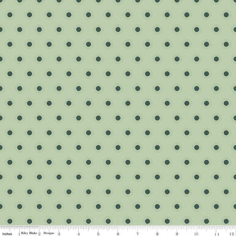 Image of the Wanderlust Sunshine Light Green quilting cotton fabric by Danelys Sidron for Riley Blake Designs. Features an array of small suns on a light pale green background. 
Cute Little Fabric Shop