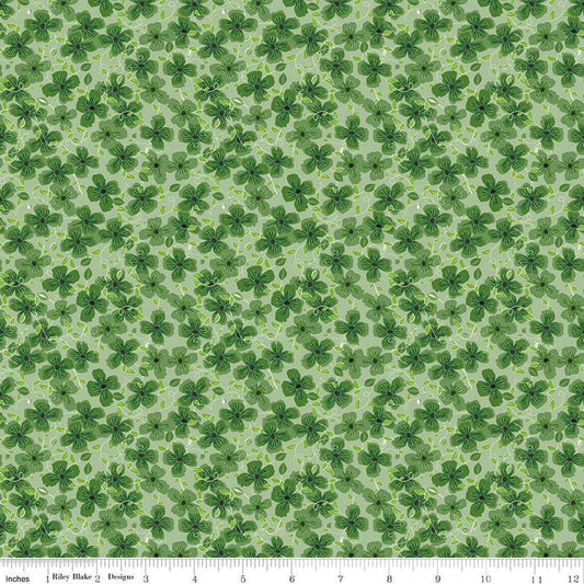 Image of the Perennial Clematis Green quilting cotton fabric by Jill Finley for Riley Blake Designs. Features flowers clustered on a light green background. 
Cute Little Fabric Shop
