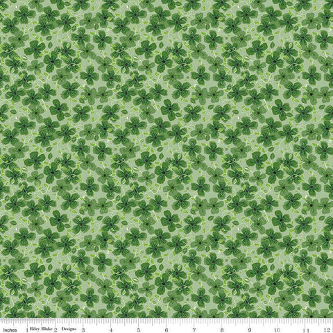 Image of the Perennial Clematis Green quilting cotton fabric by Jill Finley for Riley Blake Designs. Features flowers clustered on a light green background. 
Cute Little Fabric Shop