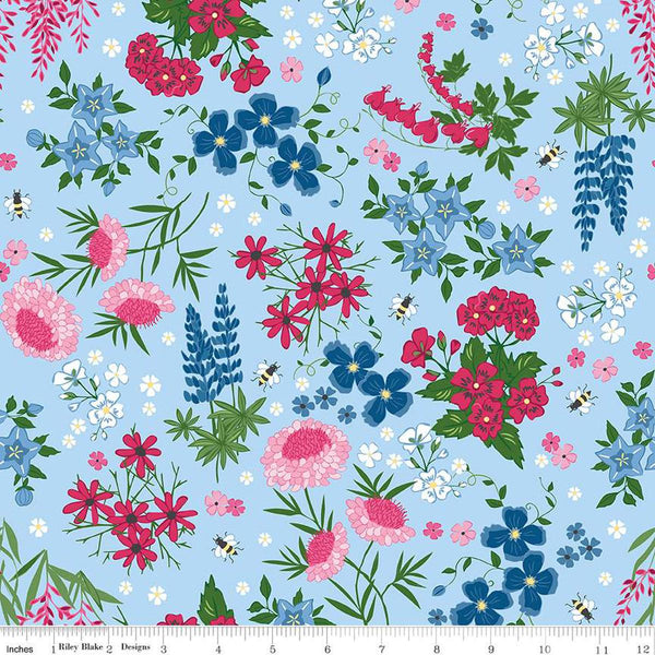 Image of the Perennial Main Sky quilting cotton fabric by Jill Finley for Riley Blake Designs. Features large flowers and leaves on a light blue background. 
Cute Little Fabric Shop