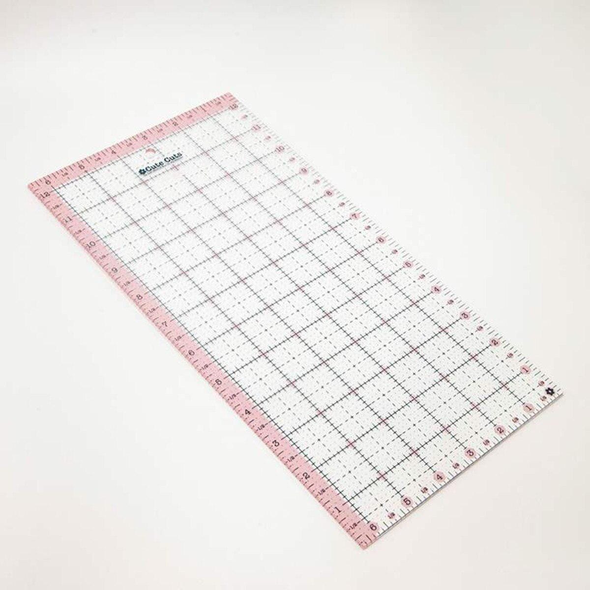 Image of the Cute Cuts™ Ruler 6 1/2" x 12 1/2" by Lori Holt for Riley Blake Designs. Features a ruler with a pink border. 
Cute Little Fabric Shop