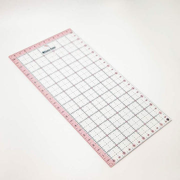Image of the Cute Cuts™ Ruler 6 1/2" x 12 1/2" by Lori Holt for Riley Blake Designs. Features a ruler with a pink border. 
Cute Little Fabric Shop